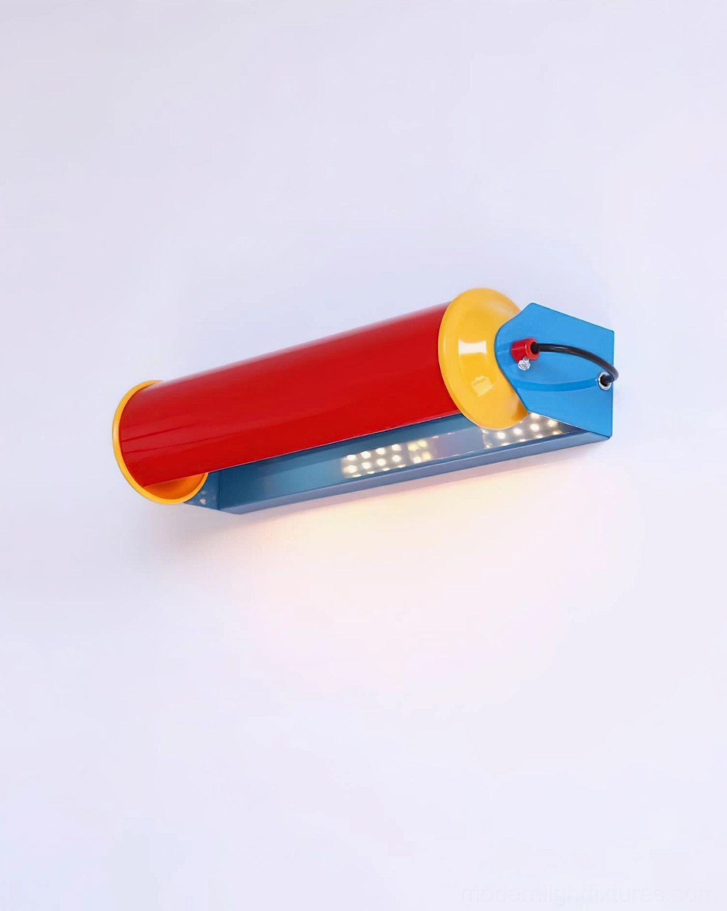 Modern cylindrical wall fixture highlighting artistic primary color palette and geometric form from artistic angle