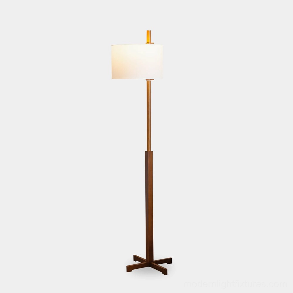 Modern walnut wood floor lamp with white cylindrical shade, full front view on studio white background showcasing mid-century design