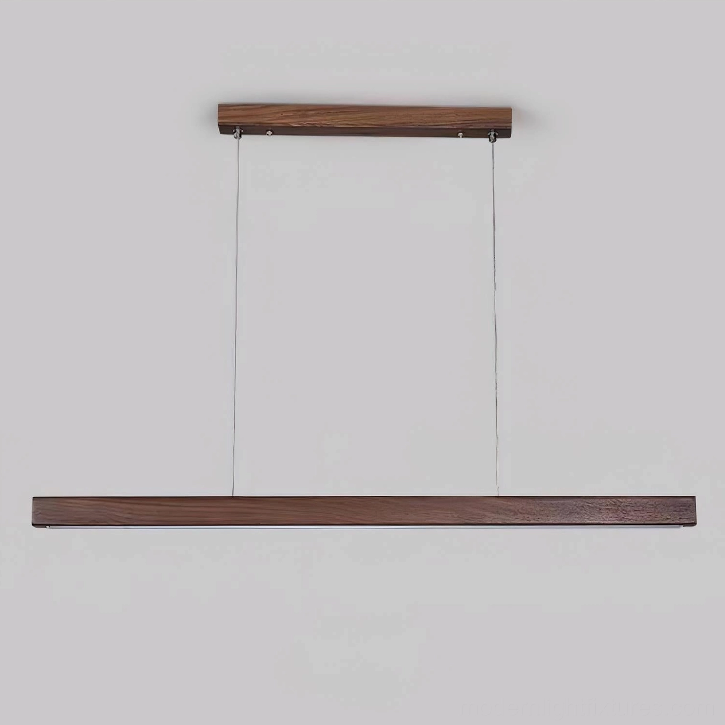 Modern walnut linear pendant chandelier with integrated LED and metal cables in contemporary dining room application