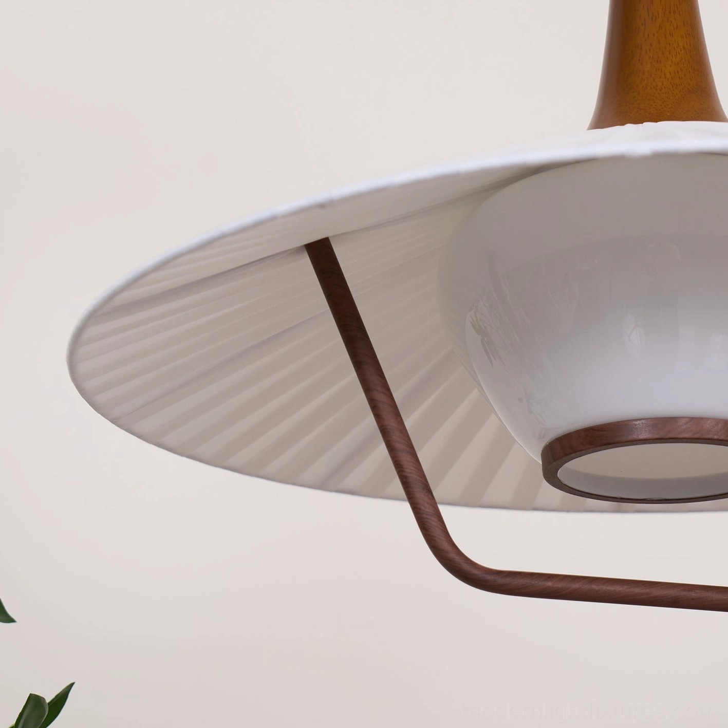 Modern walnut pendant ceiling light detailed view wood grain finish and metallic accents