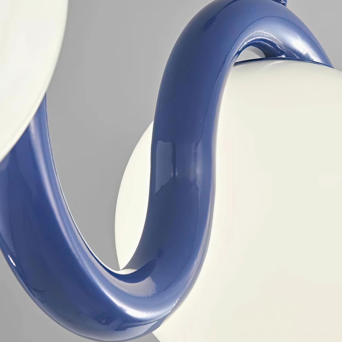 Modern wavy chandelier frosted glass orbs undulating metal frame contemporary lighting fixture