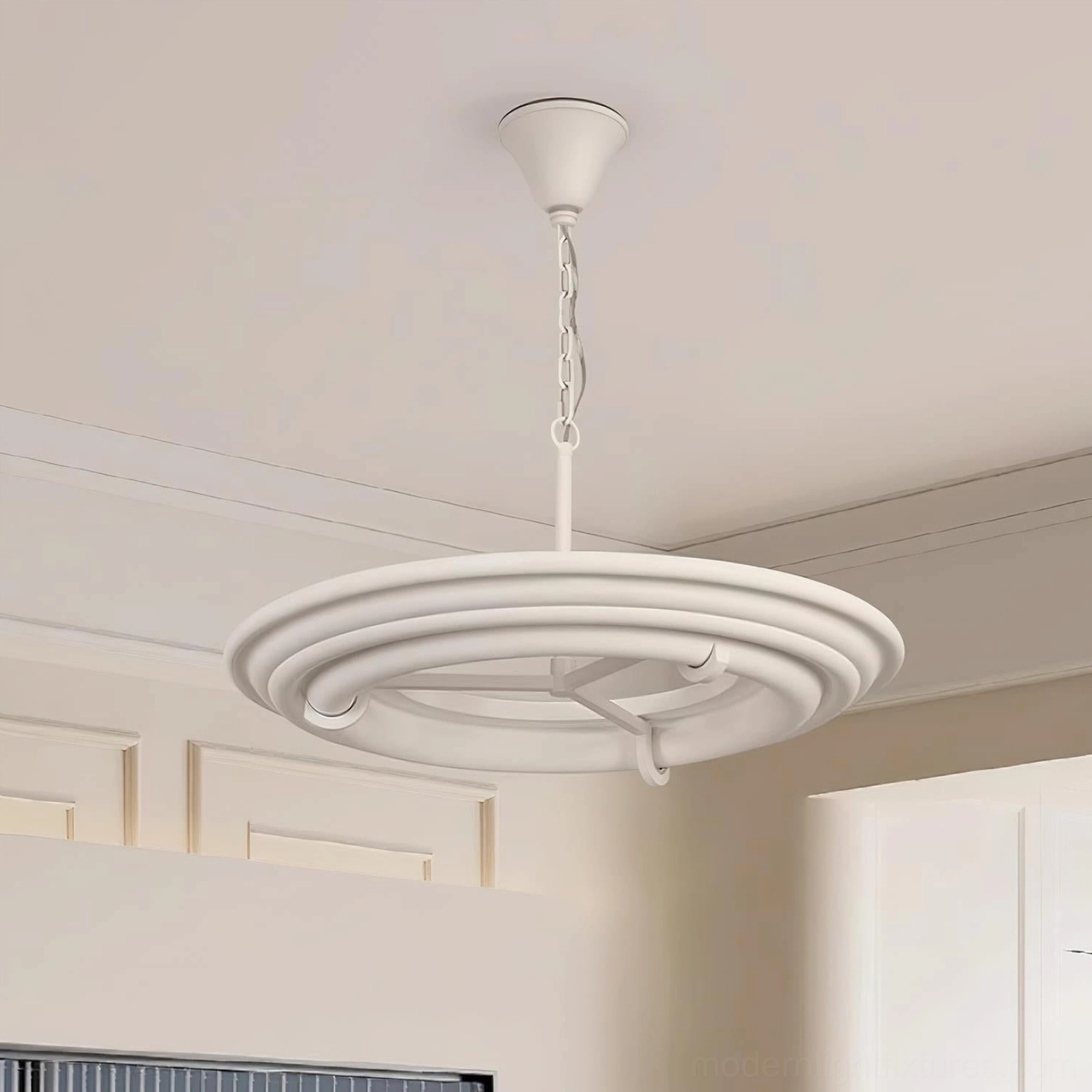 White layered ring chandelier mounted in residential space with white cabinetry and chain canopy