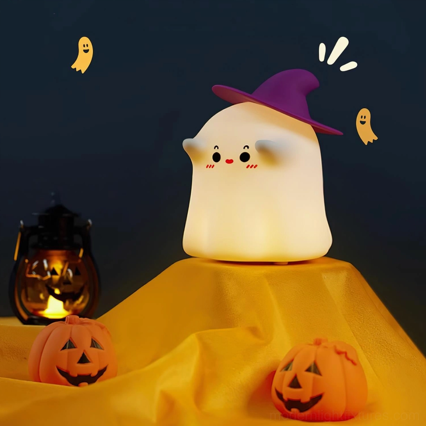 Witch ghost touch lamp positioned on Halloween tabletop with yellow cloth and lantern props
