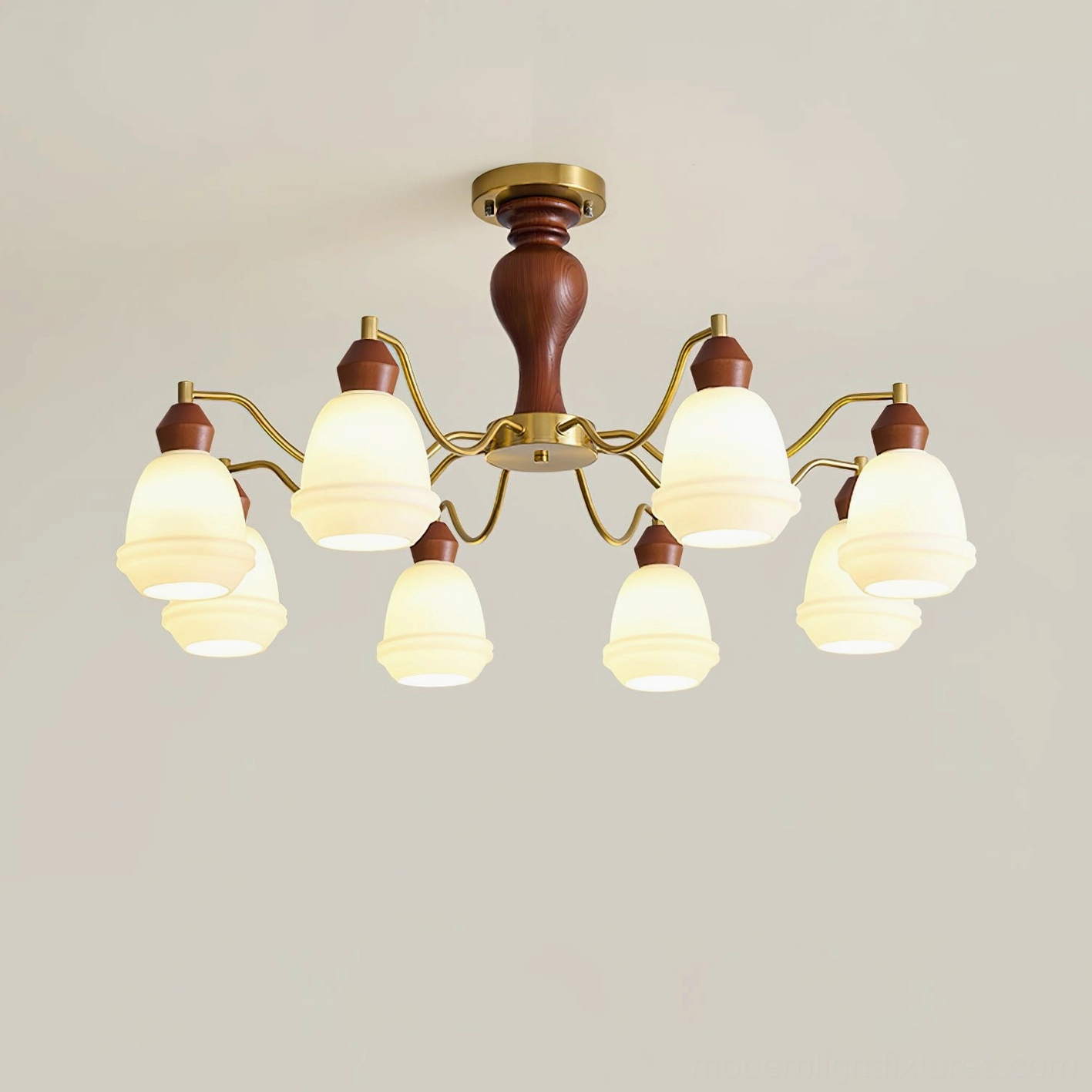 Modern wood brass chandelier with curved metal arms and frosted white glass pendant shades