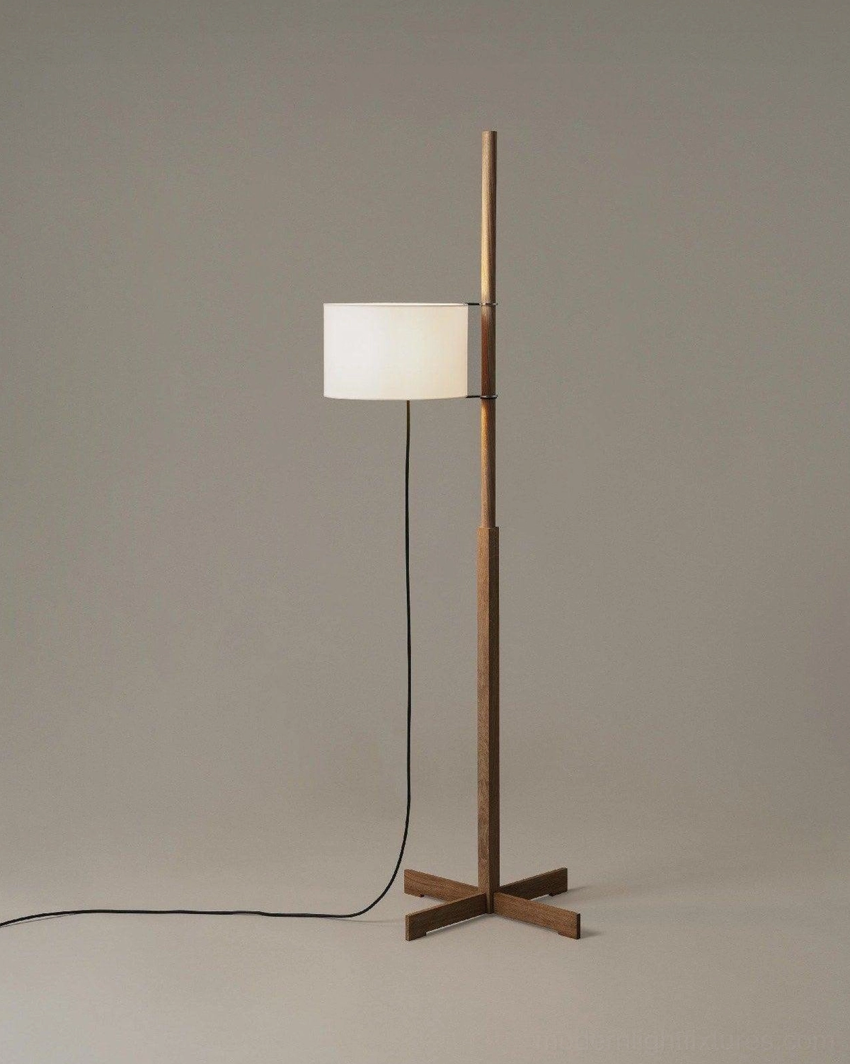 Modern wooden floor lamp creating ambient warm light in contemporary home design space