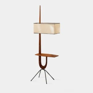 Mid-century modern wood floor lamp with tripod base and integrated side shelf, walnut color, front studio view