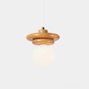 Kinetic wooden pendant light with frosted glass globe and stacked wood rings, front studio view showing natural walnut wood and white frosted shade