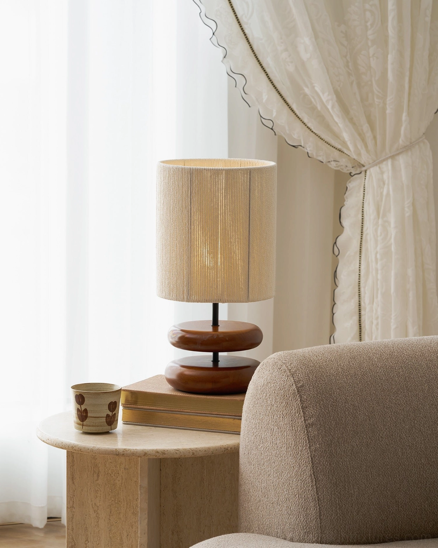 Modern wooden lamp with warm wood tones and beige shade in stylish home decor