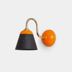 Modica mid-century modern wall sconce front view studio shot with orange backplate and perforated charcoal shade