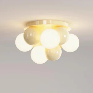 Modo Bubble modern light fixture angled view showing translucent glass orbs with warm light