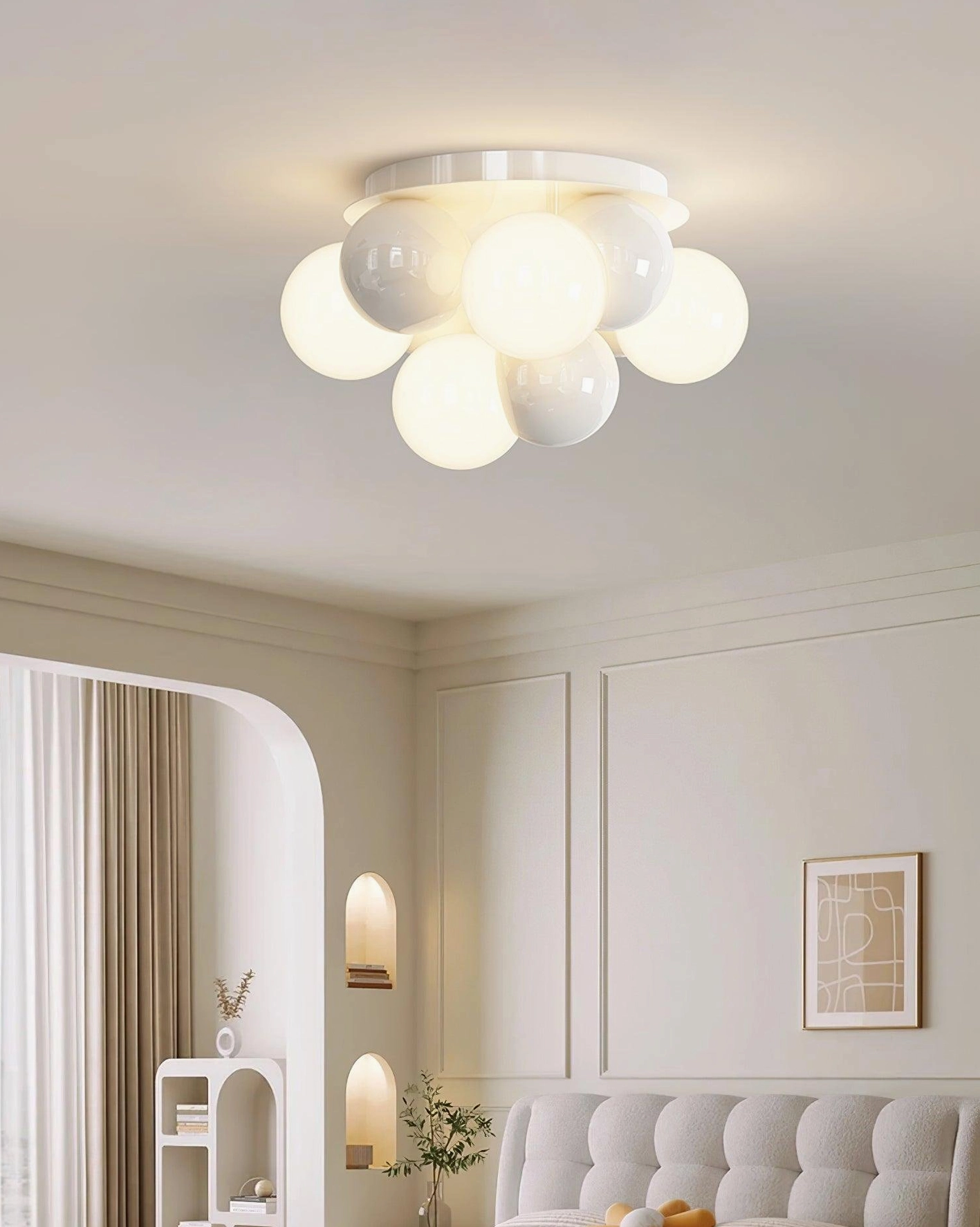 Modo Bubble cluster light fixture installed in contemporary living room silver mount
