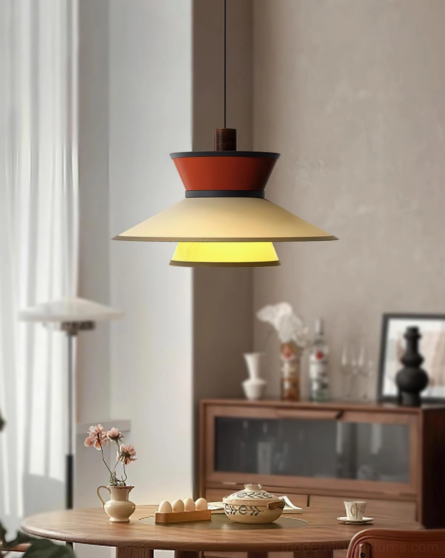 Modula geometric pendant light side view, showing layered disc architecture and proportions