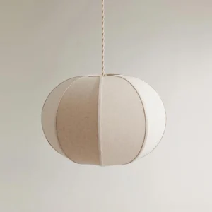 Mollis pendant light three-quarter angle showing paneled spherical beige fabric shade and wooden frame detail