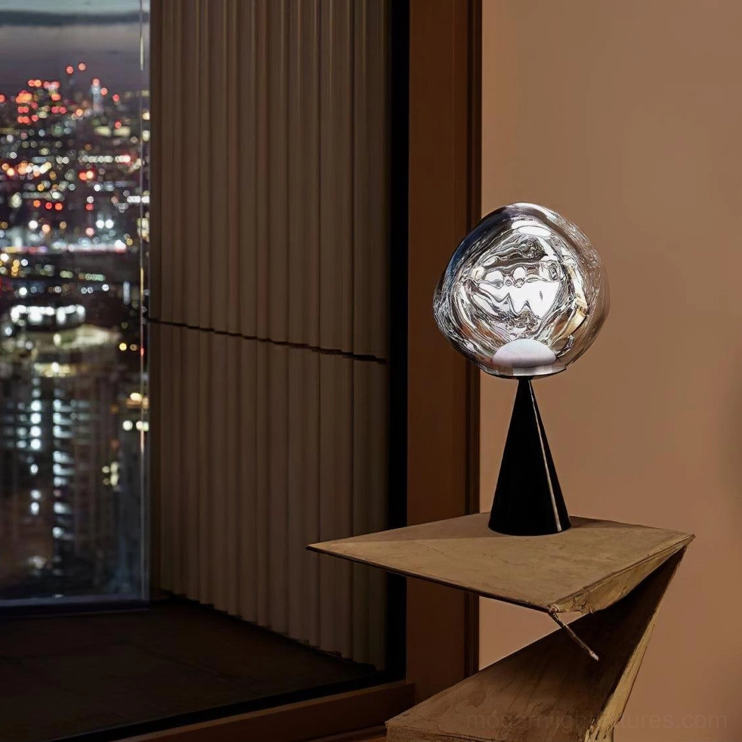 Molten glass cone table lamp side view black tapered base high-rise apartment shelf city backdrop