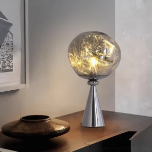 Modern molten cone table lamp three-quarter view on side table with ceramic bowl home décor styling