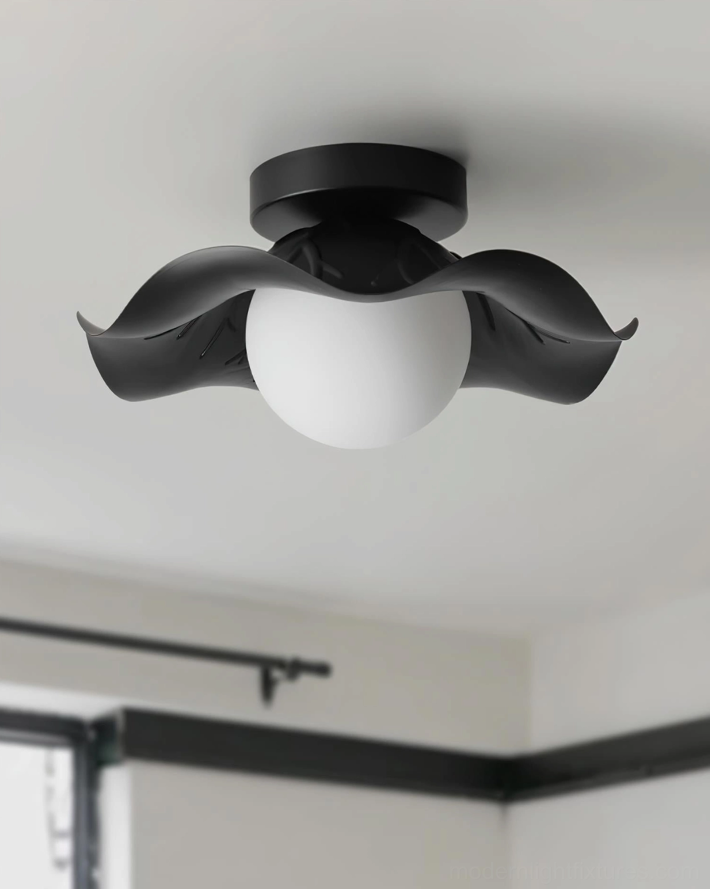 Monae semi-flush ceiling light side overhead view frosted white glass globe black matte metal trim