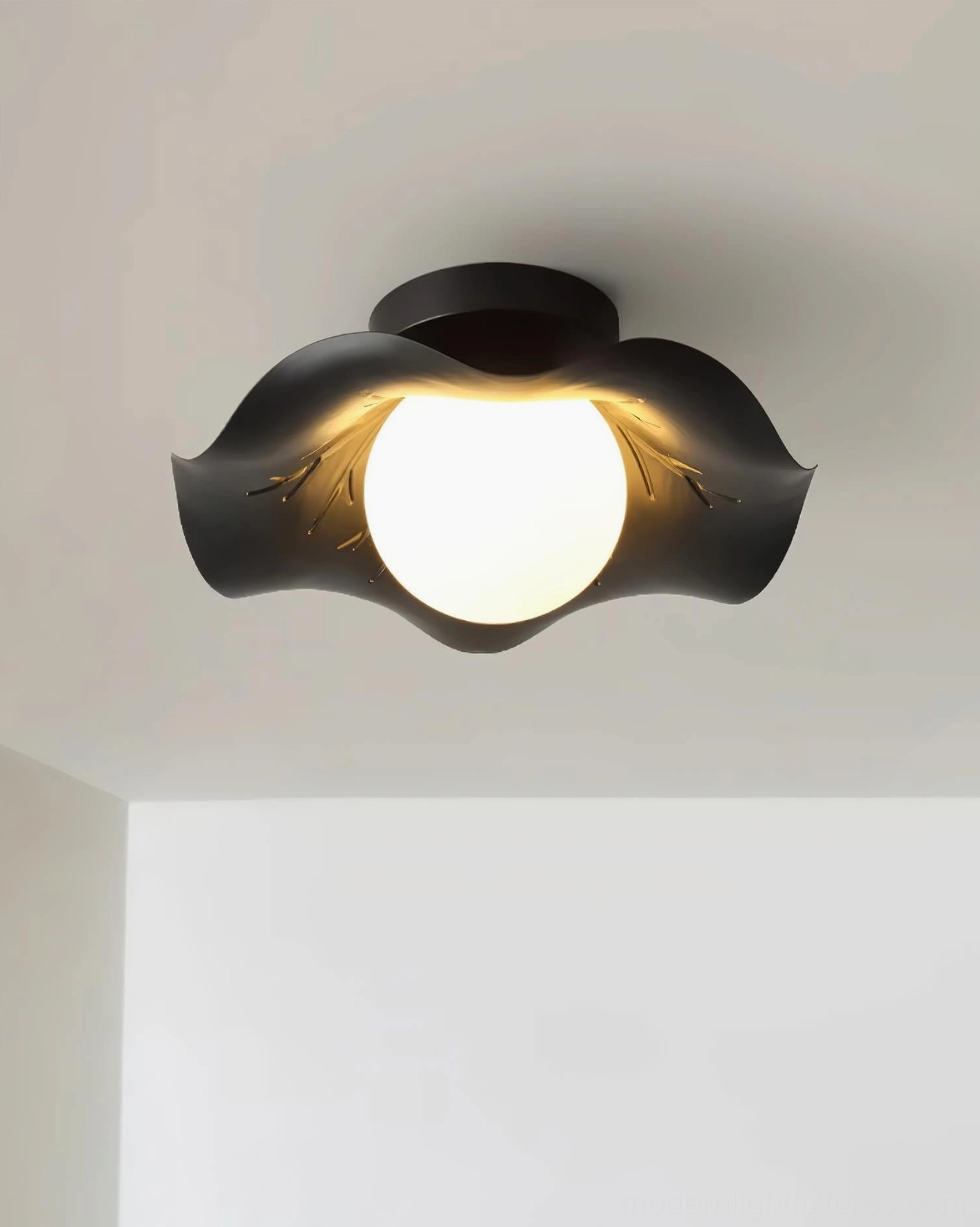 Monae dual-use wall ceiling light fixture with embossed branch details and warm ambient lighting