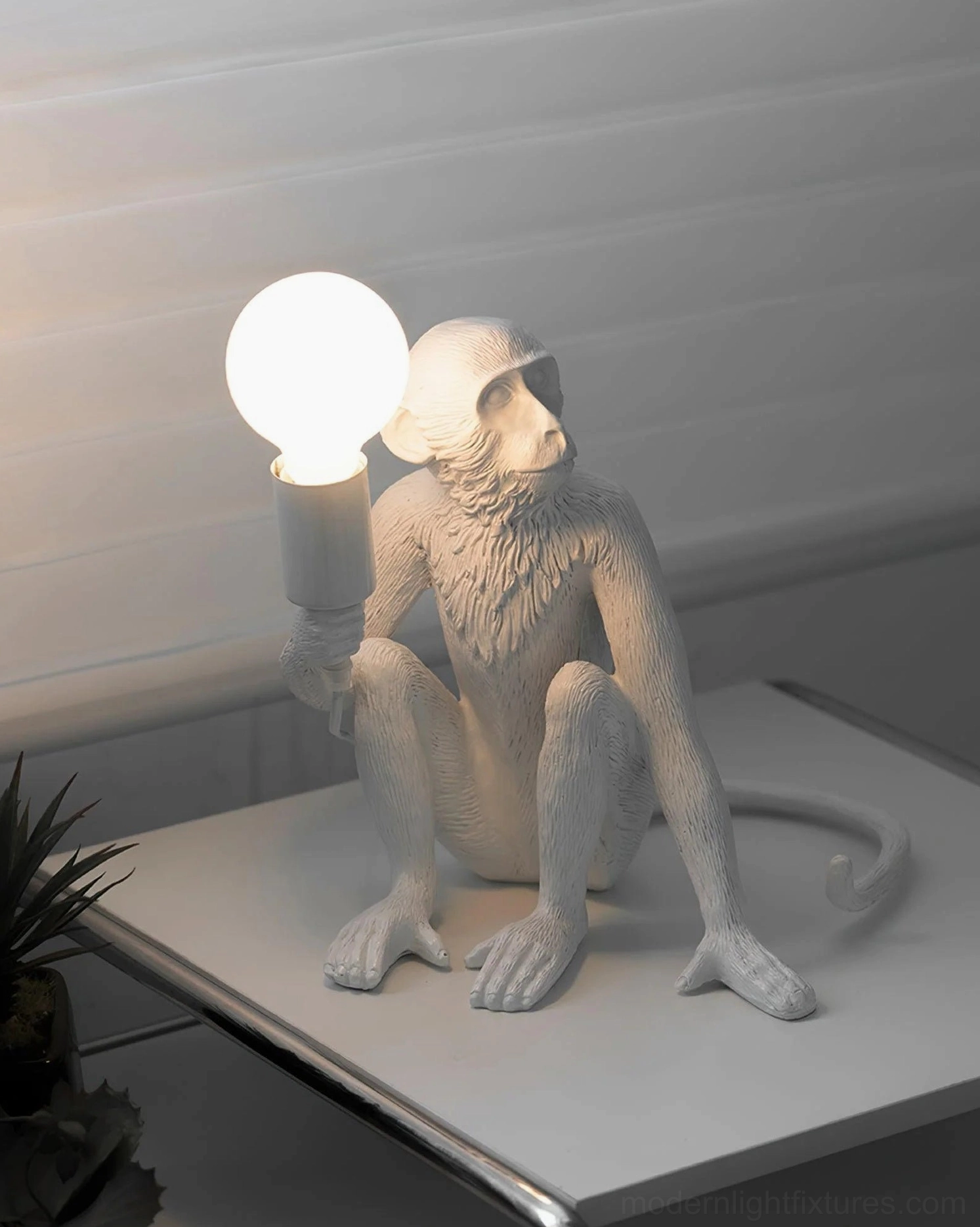 Monkey table lamp exposed bulb socket artistic lighting design