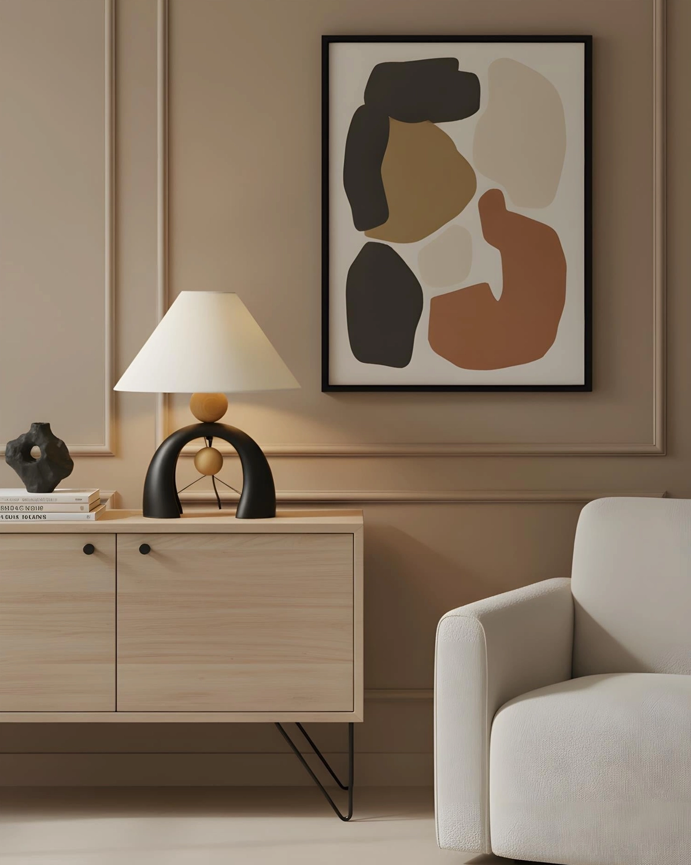 Modern sculptural table lamp displayed on wooden storage cabinet with beige paneled wall in contemporary living room