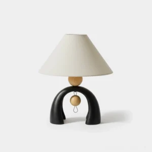 Mono Arch modern table lamp with sculptural black resin base and warm wood sphere accents, front view on white background