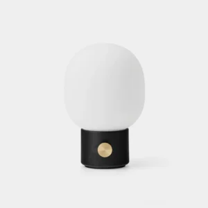 Monolith modern table lamp with black metal base and frosted glass shade - front studio view on white background