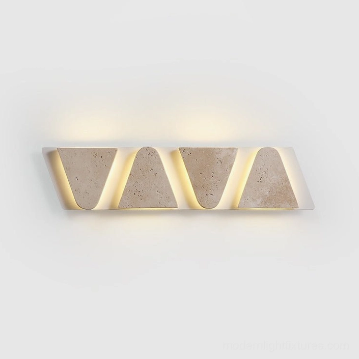 Monolith wall sconce beige travertine finish showing natural stone texture and character