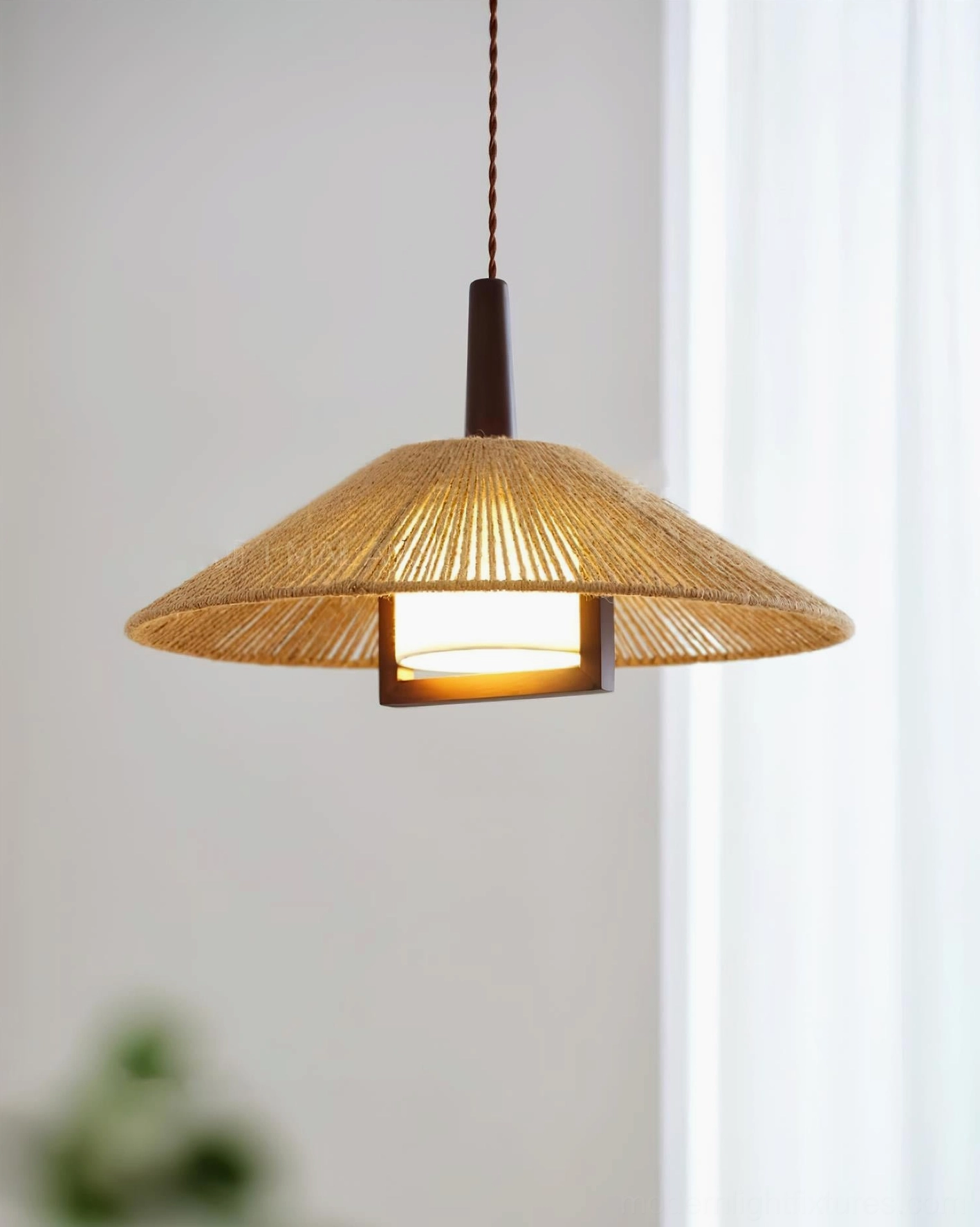 Mons hemp rope pendant lamp close-up front view showing woven texture and inner light frame detail