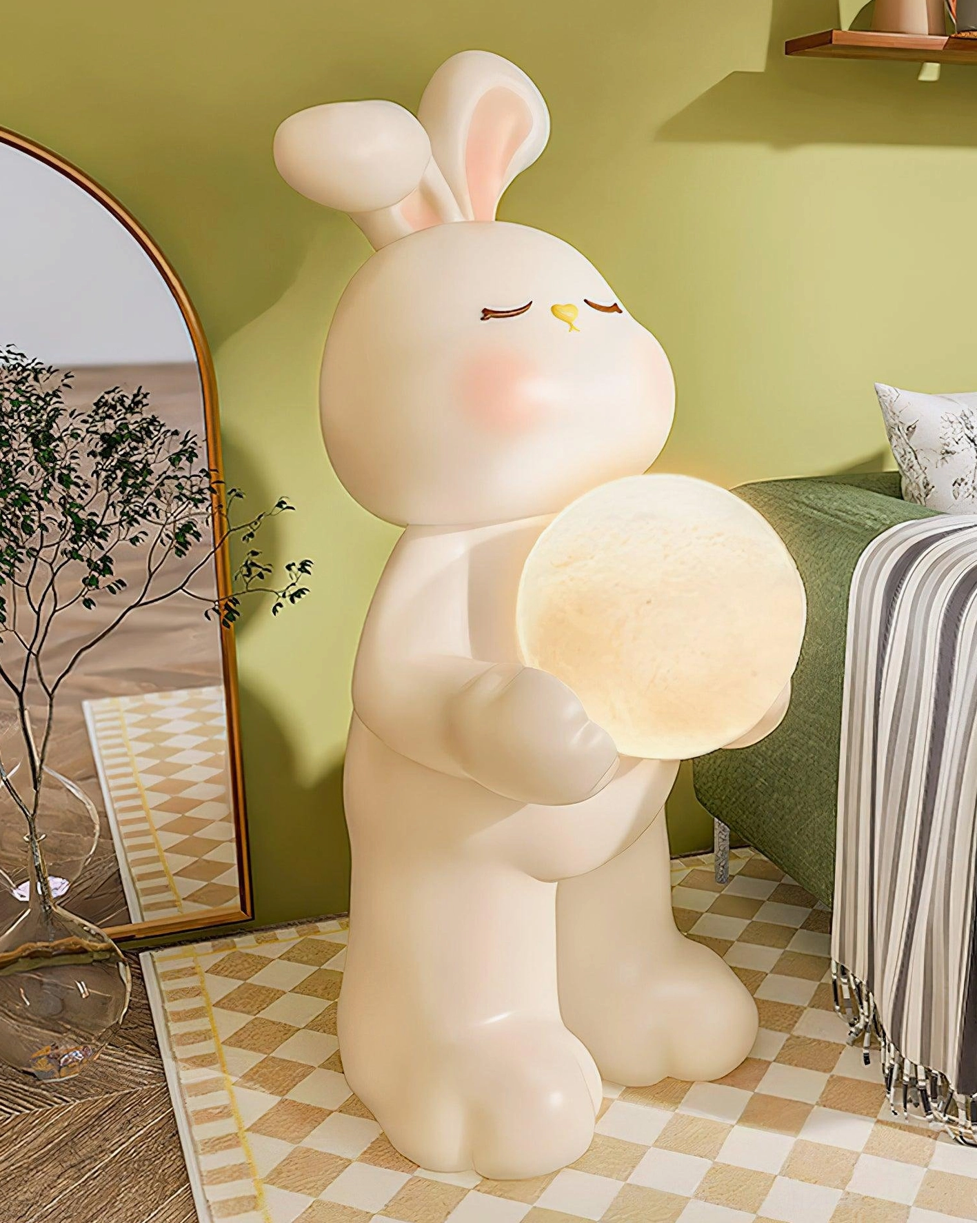 Moon rabbit floor lamp three-quarter view in modern bedroom with green wall and arched mirror