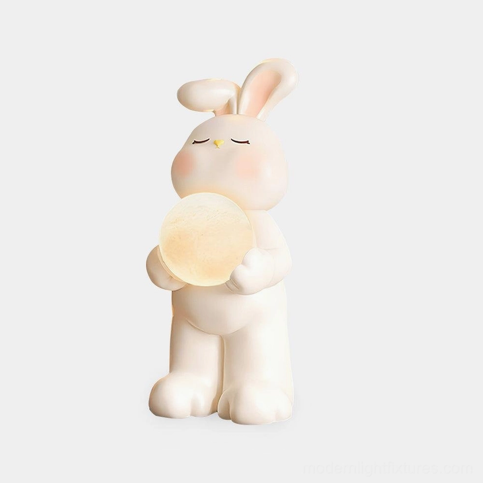 Moon rabbit floor lamp front view with soft matte white finish and glowing lunar light