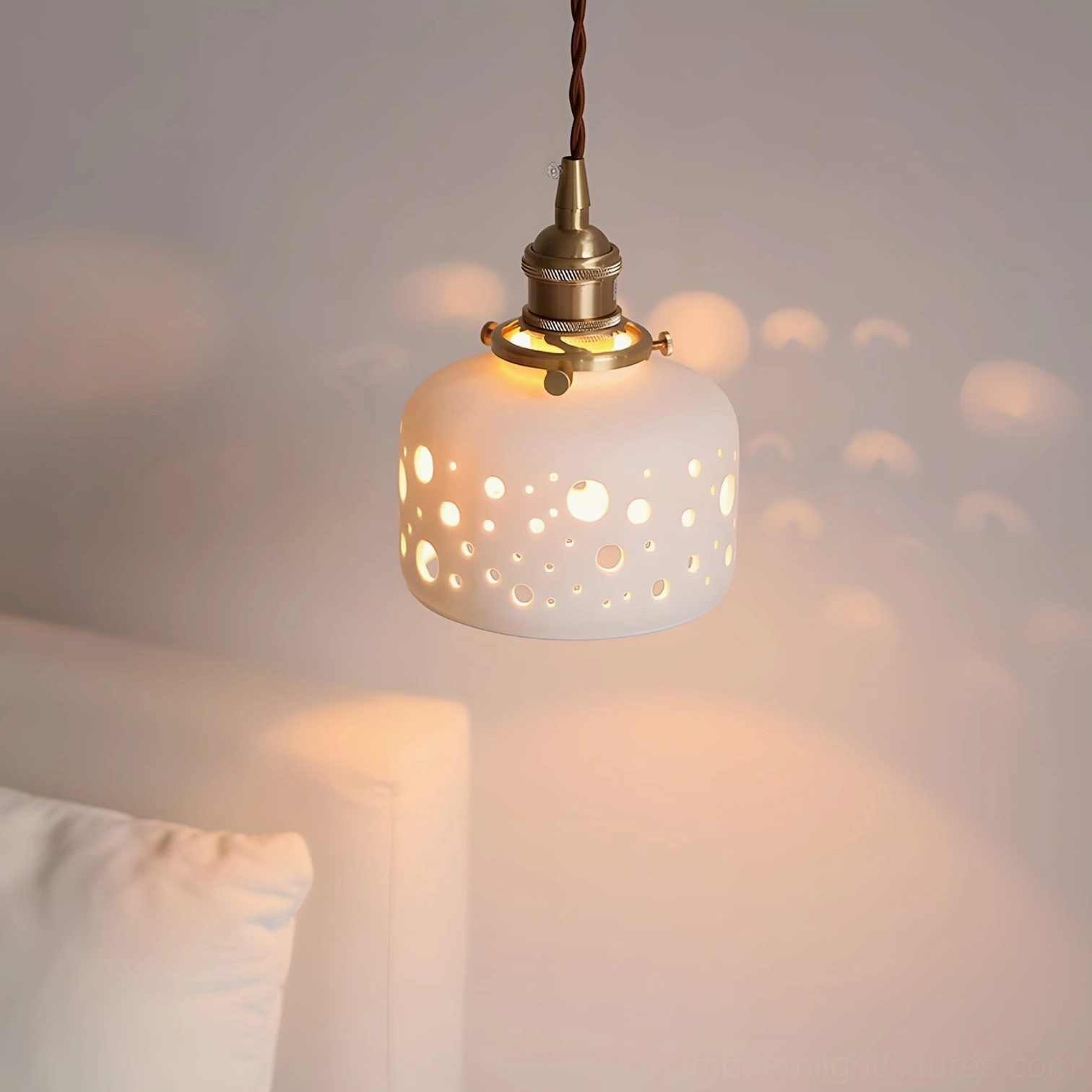 Moonveil pendant lamp in bedroom corner projecting circular light patterns on wall, creating atmospheric bedroom lighting