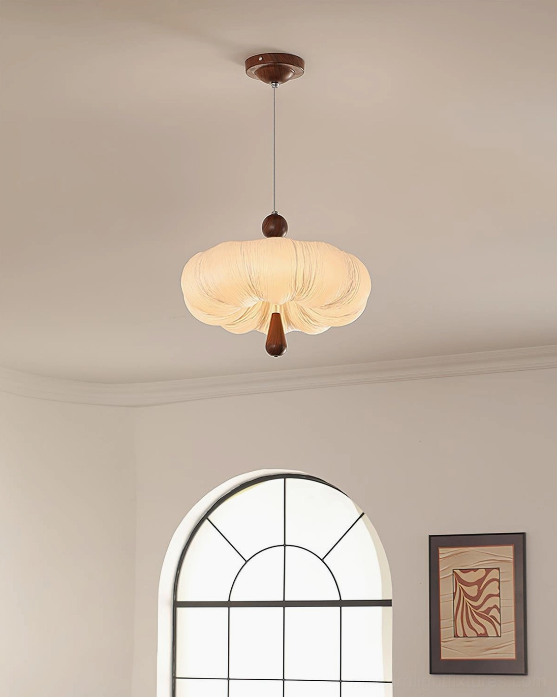 Compact Mori Puff Pendant Light with scalloped cream shade suspended in residential entryway