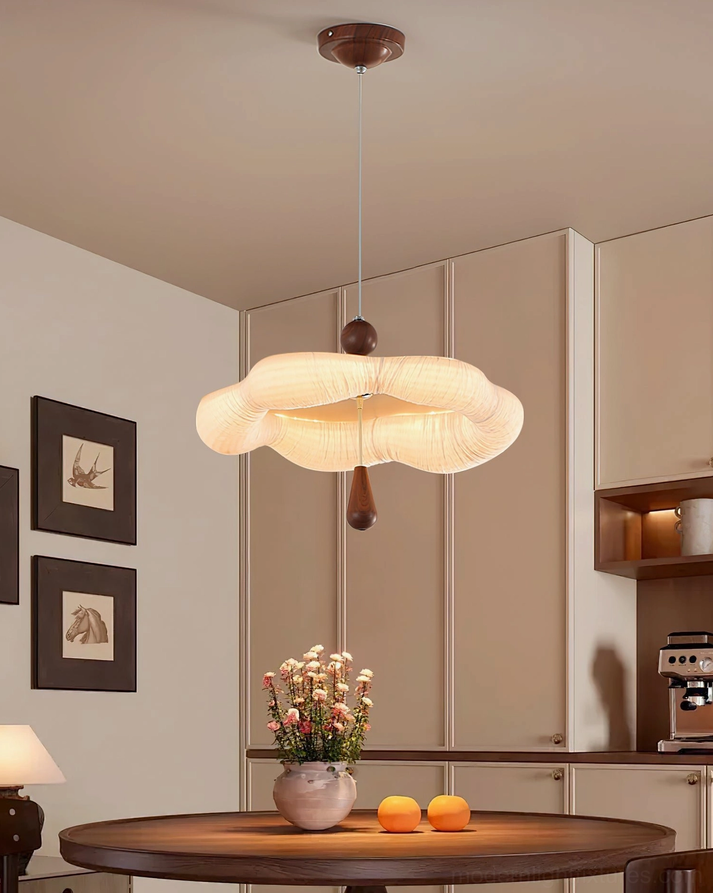 Modern Mori Puff Pendant Light suspended in warm dining room, ambient lighting over dining table