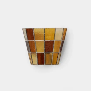 Modern mosaic glass wall sconce with orange stained glass tiles and metal frame, frontal studio view