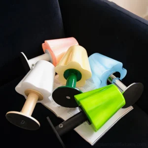 Collection of Mossy contemporary table lamps in multiple color combinations displayed together overhead view showing variety of pastel and bold shades