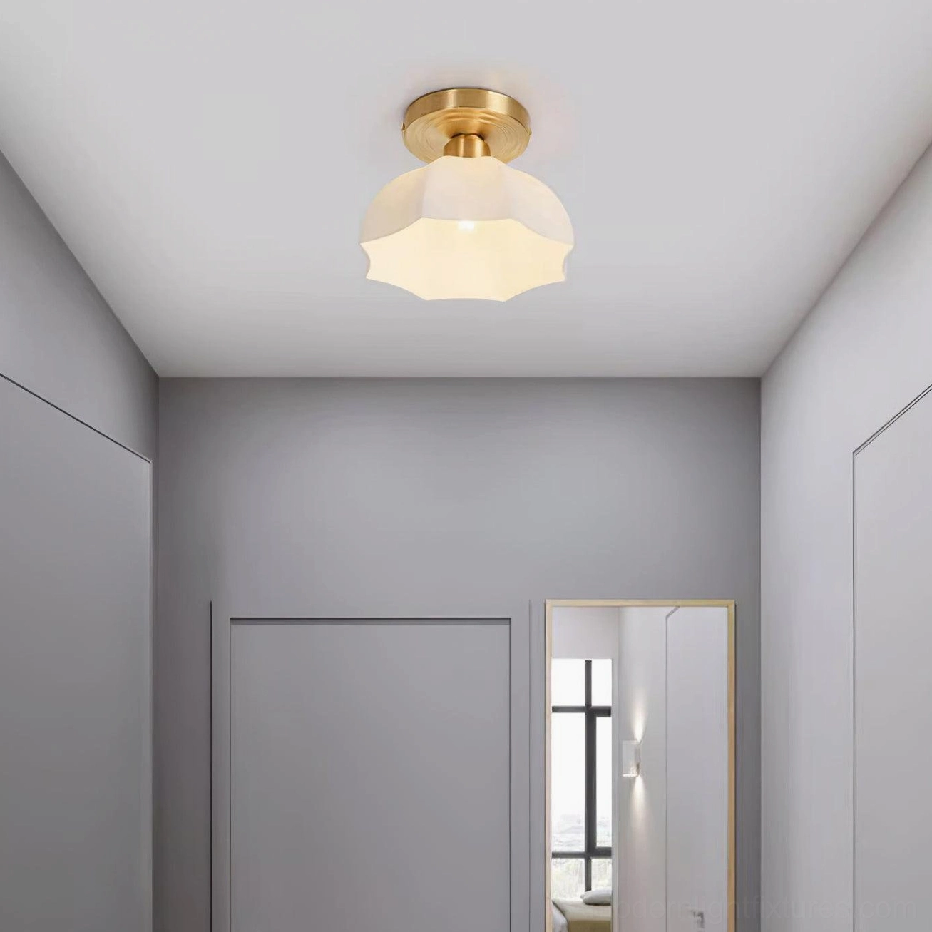 Scalloped ceiling light fixture mounted on wall or ceiling showing installation angle