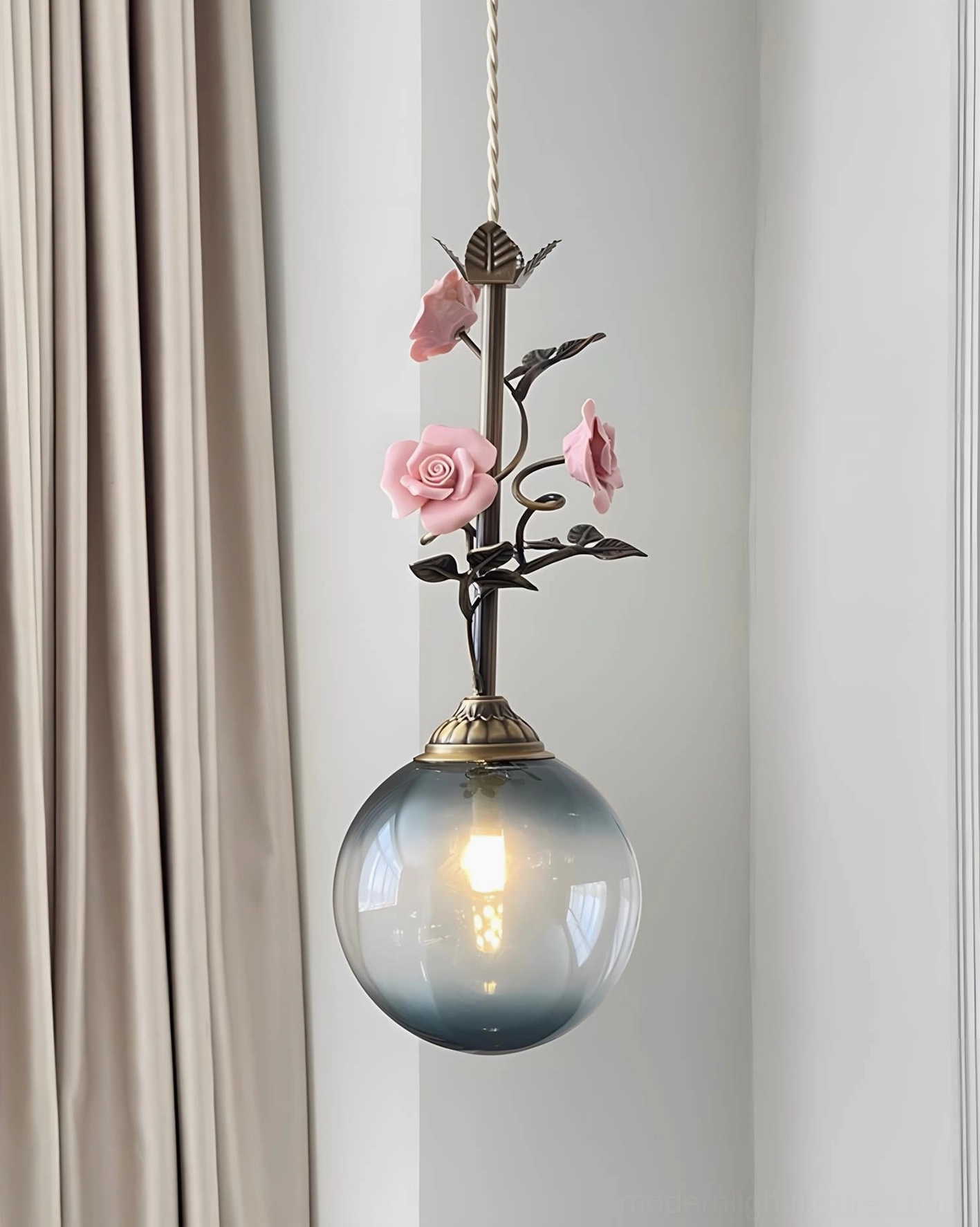 Multi-finish floral pendant light options in clear, pink, white, and blue glass