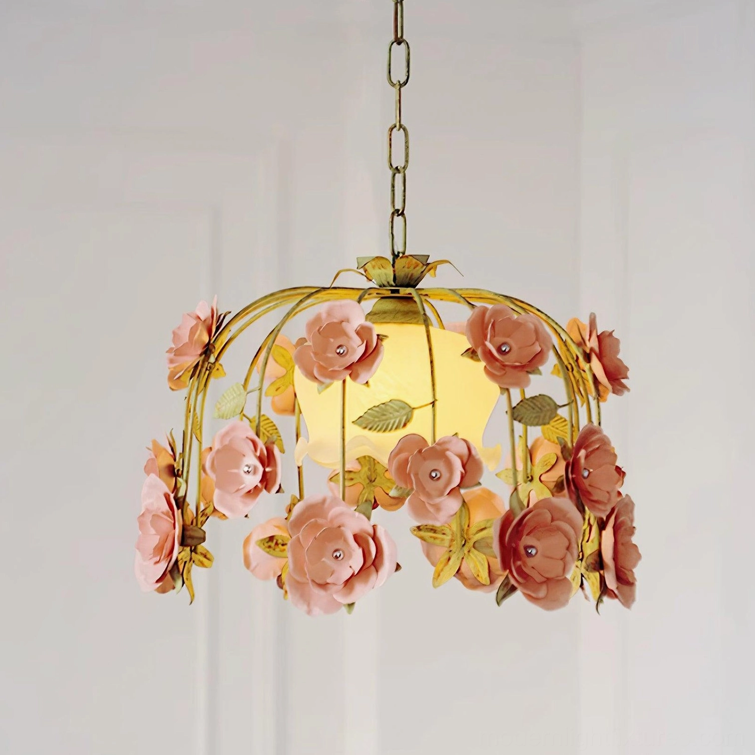 Multi-floral pendant chandelier with reddish-brown and pink hand-carved flowers, yellow decorative leaves, warm pastoral aesthetic