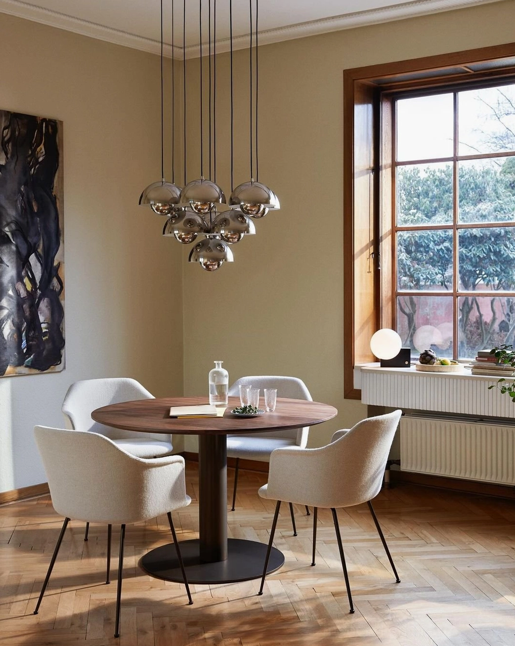 Modern multi-head dome pendant chandelier in contemporary home interior showing functional artistic lighting fixture