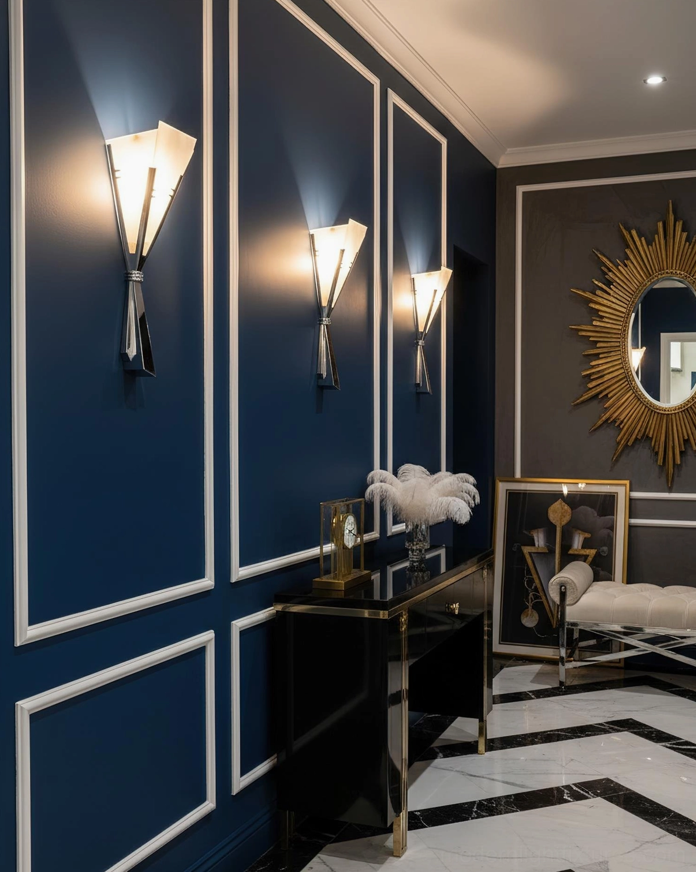 Multiple Art Deco wall sconces in formal luxury living room with navy paneled walls, white trim, and high-end furniture arrangement
