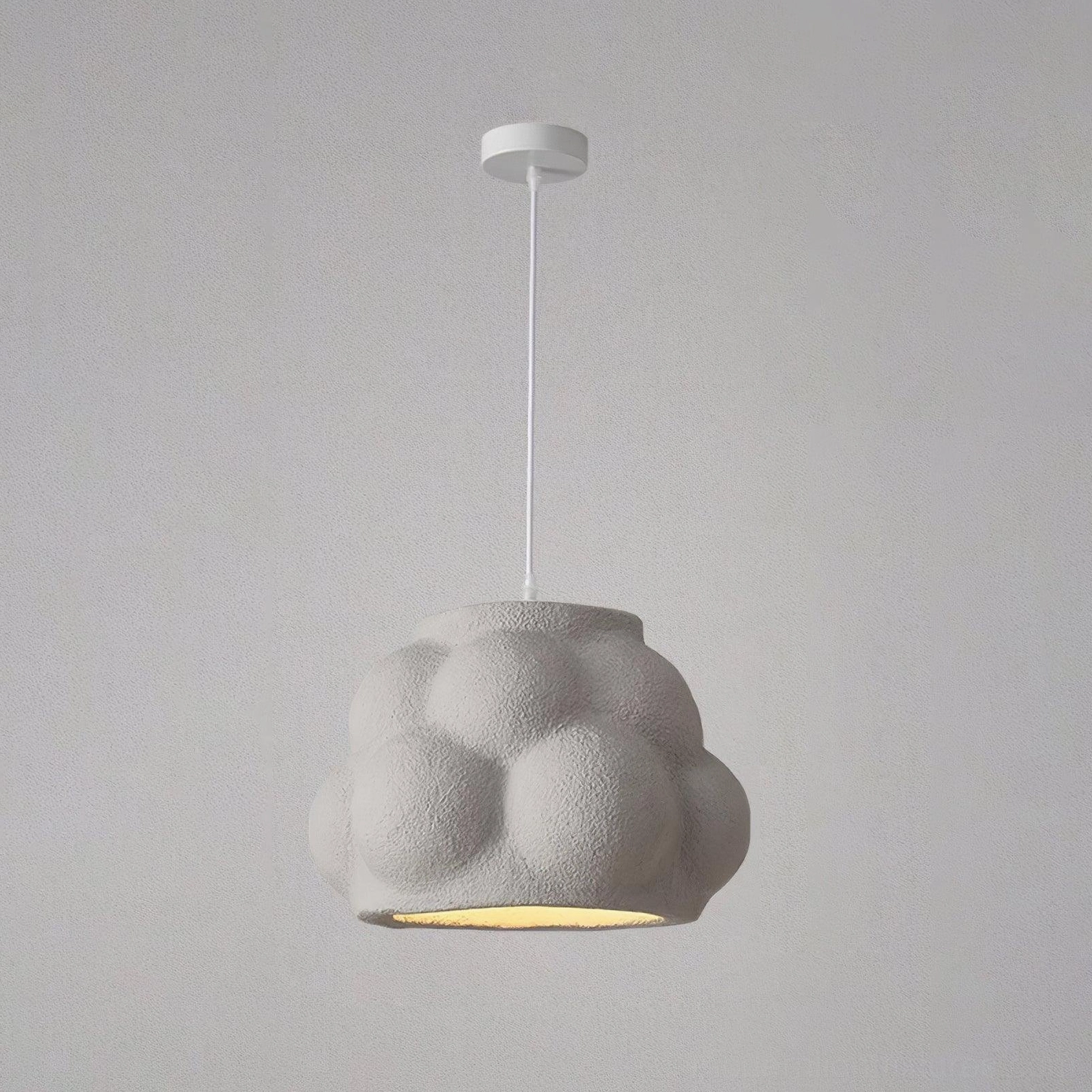 Clustered wabi-sabi cloud pendant lamps creating artistic lighting statement in modern space