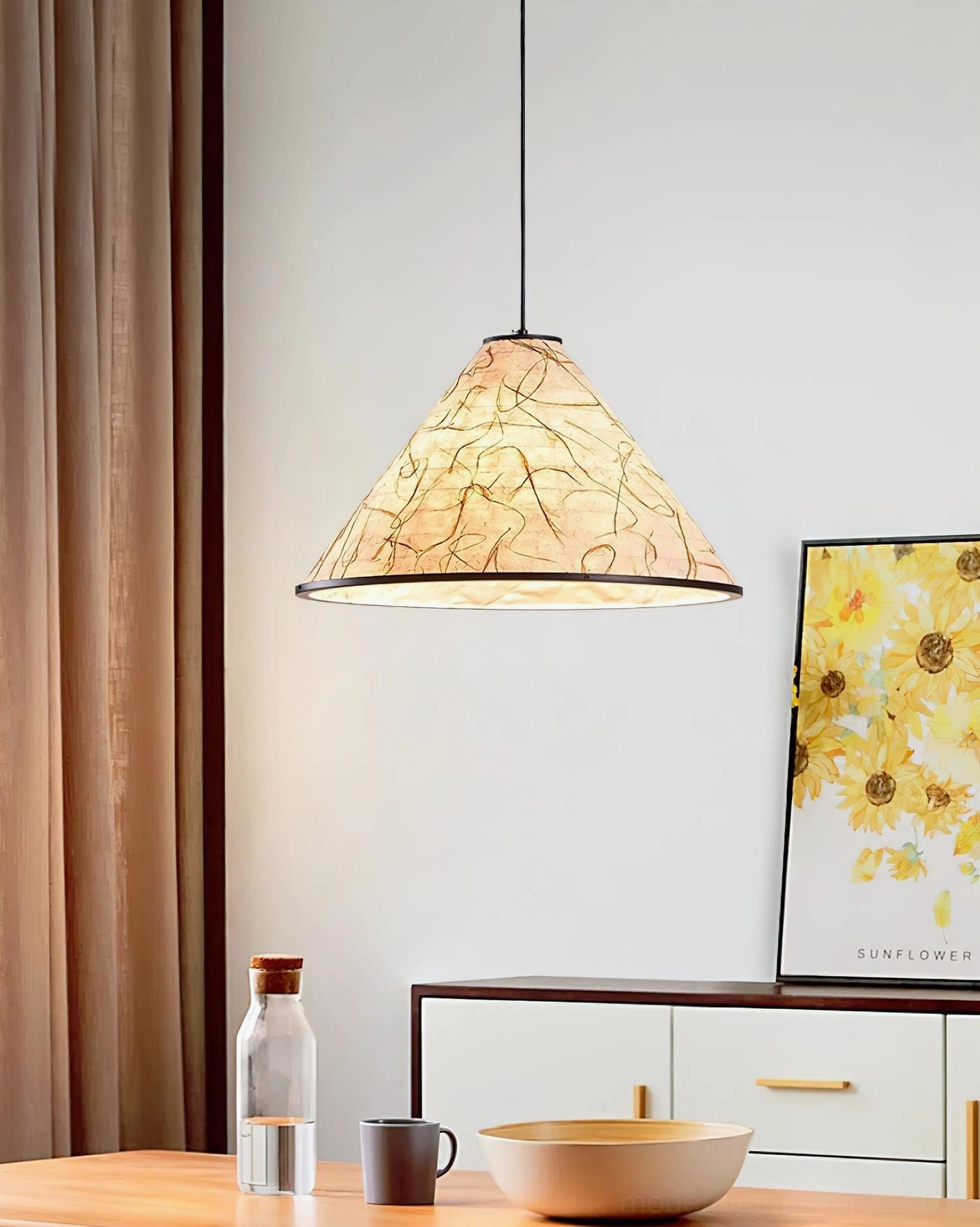 Multiple cone pendant lamps suspended together creating coordinated modern lighting installation