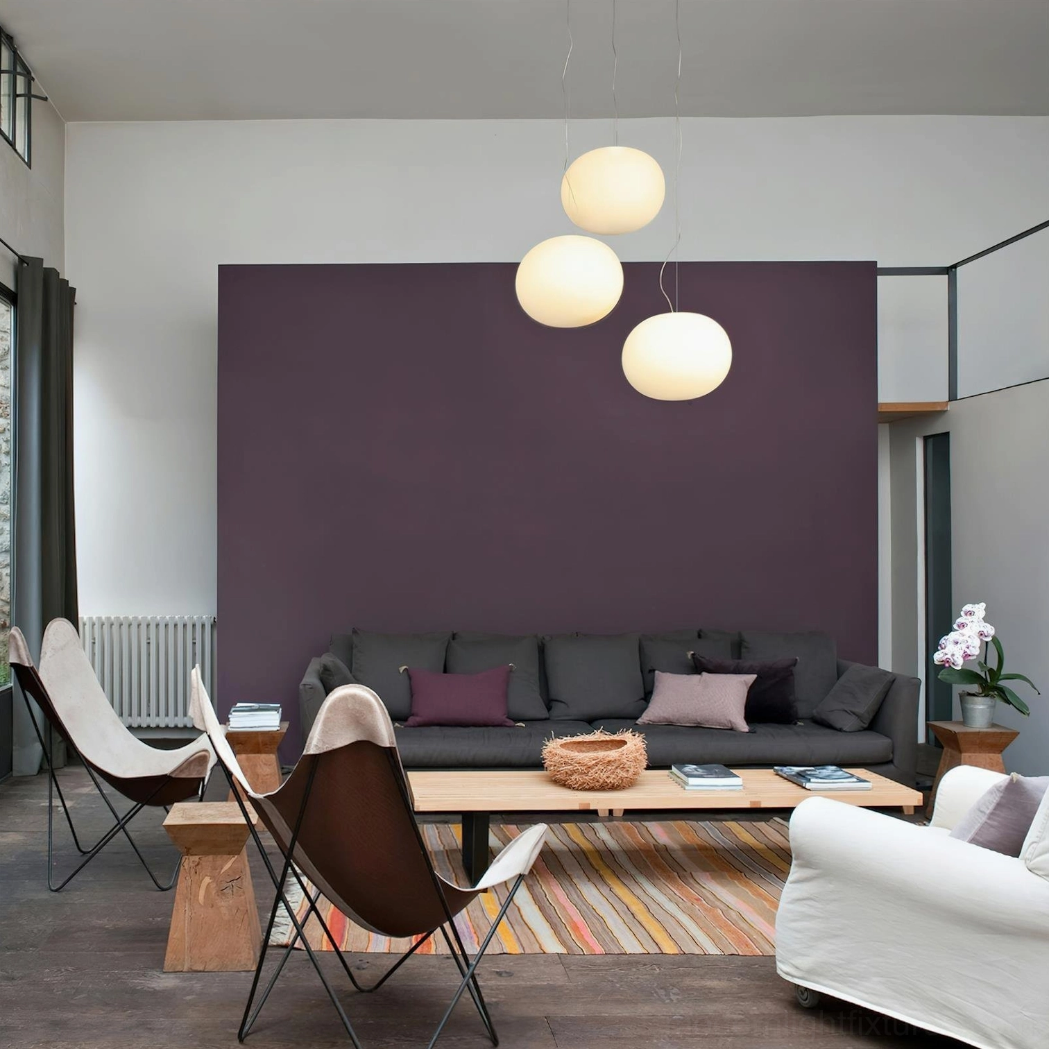 Multiple frosted glass sphere pendants installation - modern minimalist lighting design with coordinated pendant lamps