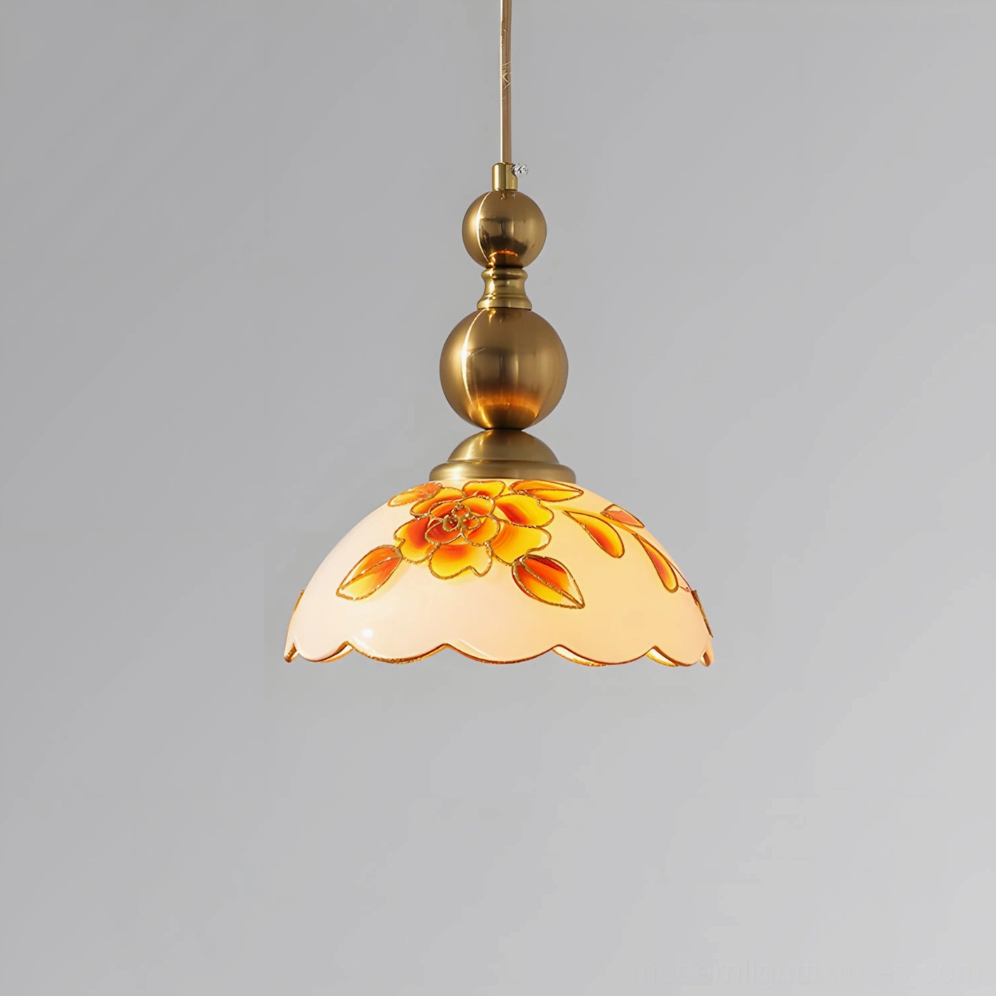 Multiple hand-painted floral pendant lights in coordinated home lighting design scheme