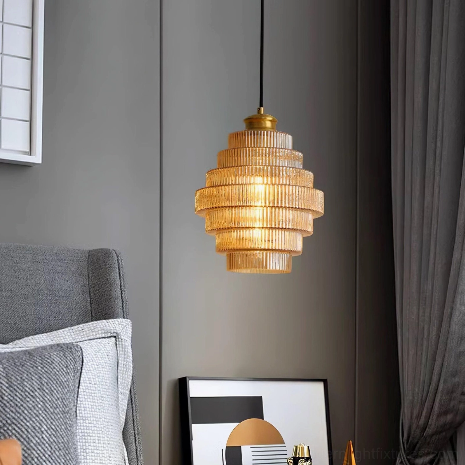 Multiple ridged glass pendant lights in open-concept space, amber and smoke gray finishes
