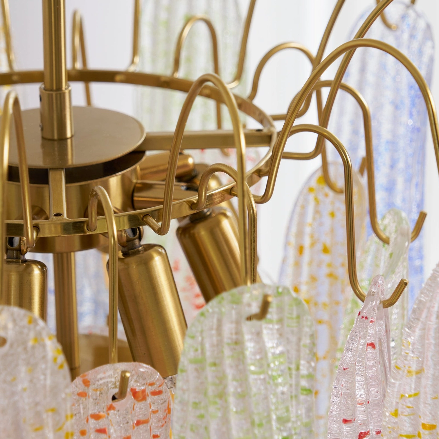Murano glass chandelier hardwired installation detail with brass metal fixture components