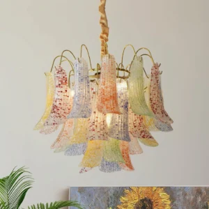 Pastel speckled Murano glass pendant light with brass frame overhead view, twisted fabric cord detail