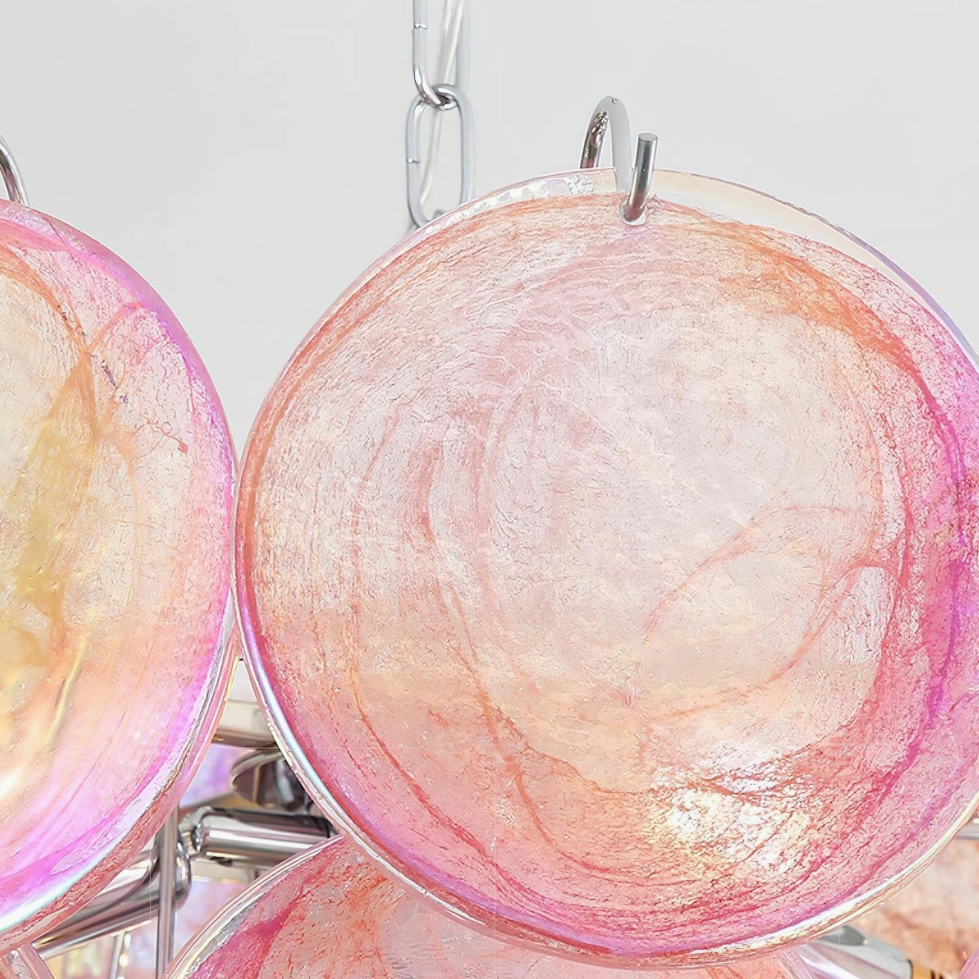 Orange iridescent hand-blown Murano glass disc chandelier with chrome suspension frame
