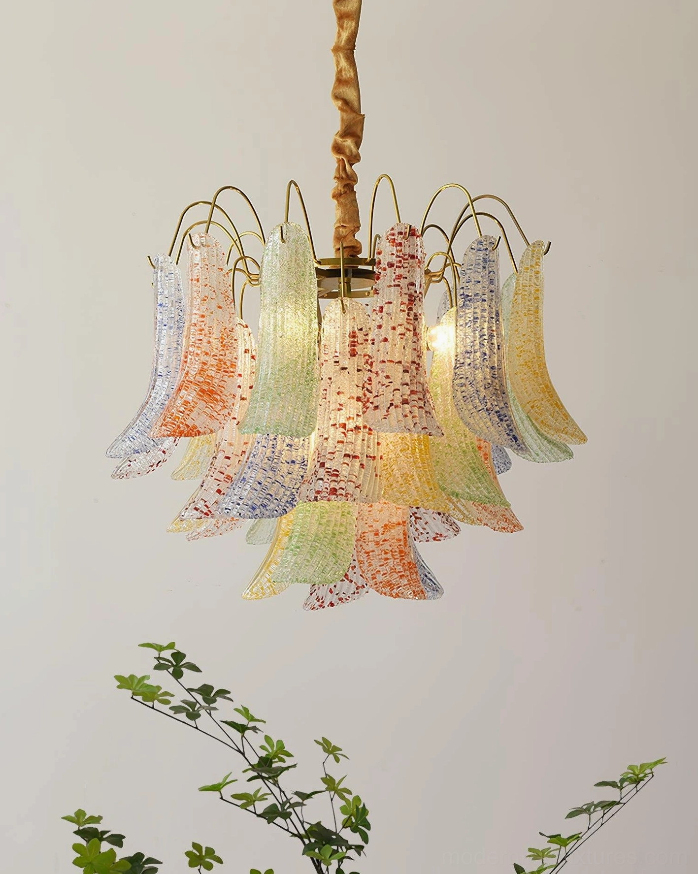 Trumpet petal textured glass chandelier with warm pastel tones, minimalist interior close-up detail