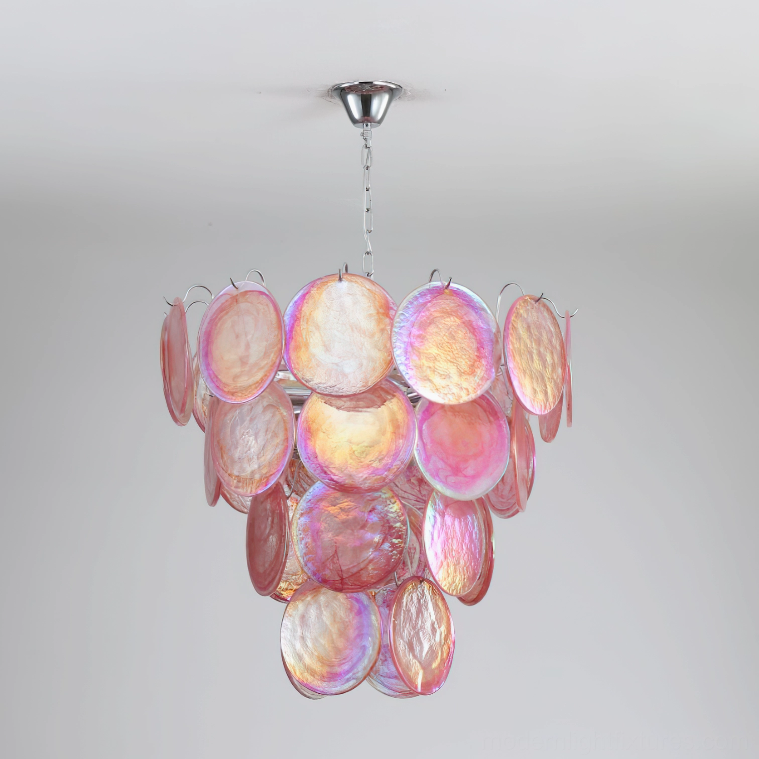 Symmetrical layered design of pink iridescent Murano glass disc chandelier close-up overhead view
