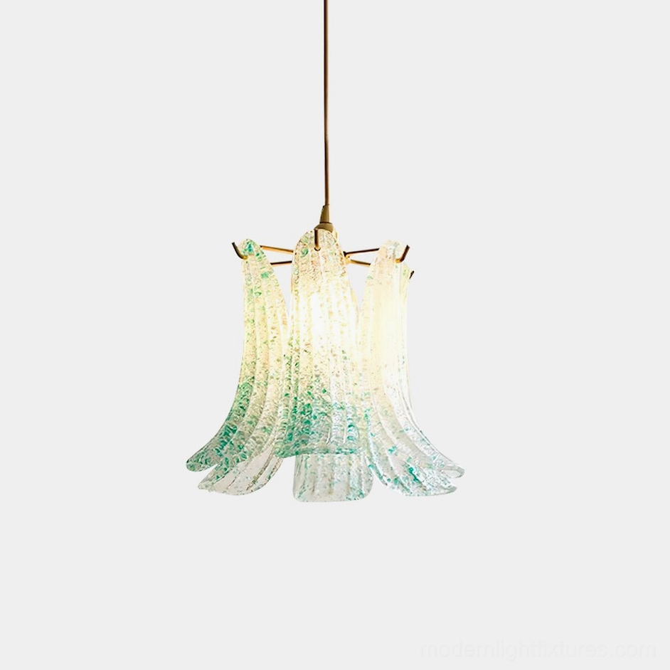 Handcrafted Murano glass lily pendant lamp with green speckled glass and brass hardware, front studio view with warm LED bulb